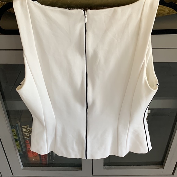 Darling tank. It’s lined and zips up back. - Picture 2 of 2